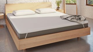 The Panda London Bamboo Mattress Topper on a bed