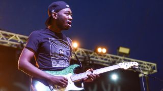 Isaiah Sharkey performs at Love Supreme Jazz Festival at Glynde Place on July 02, 2022 in Lewes, England.