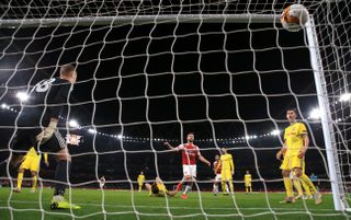 Arsenal’s Shkodran Mustafi (centre) scores his side’s second goal