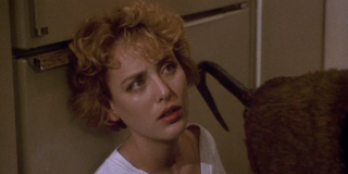 Virginia Madsen as Helen Lyle and Candyman in the 1992 movie