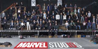 Marvel Studios anniversary photo heroes in bleachers