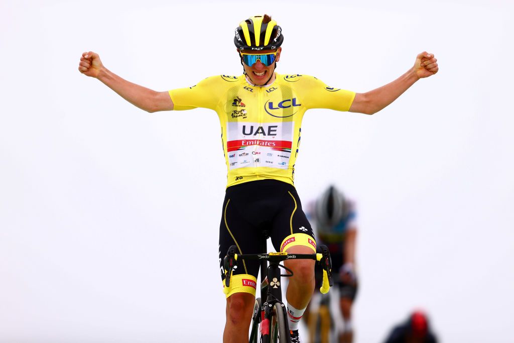 SAINTLARYSOULAN COL DU PORTET FRANCE JULY 14 Tadej Pogaar of Slovenia and UAETeam Emirates Yellow Leader Jersey celebrates at arrival during the 108th Tour de France 2021 Stage 17 a 1784km stage from Muret to SaintLarySoulan Col du Portet 2215m LeTour TDF2021 on July 14 2021 in SaintLarySoulan Col du Portet France Photo by Michael SteeleGetty Images