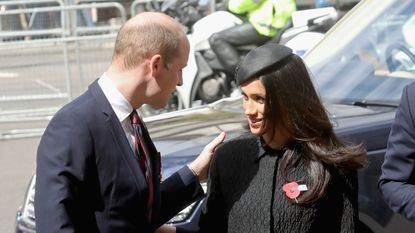 Meghan Markle Prince William kiss greeting