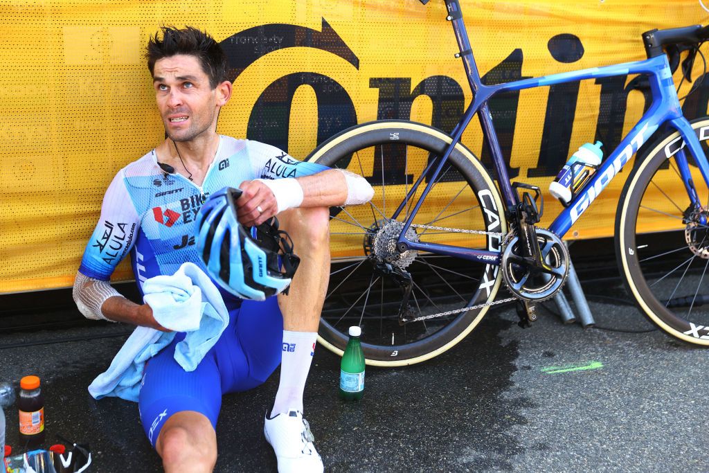 HAUTACAM FRANCE JULY 21 Jack Bauer of New Zealand and Team BikeExchange Jayco injured after being involved in a crash with a motorbike reacts after the 109th Tour de France 2022 Stage 18 a 1432km stage from Lourdes to Hautacam 1520m TDF2022 WorldTour on July 21 2022 in Hautacam France Photo by Michael SteeleGetty Images