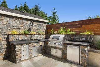 outdoor kitchen with herb garden on shelf