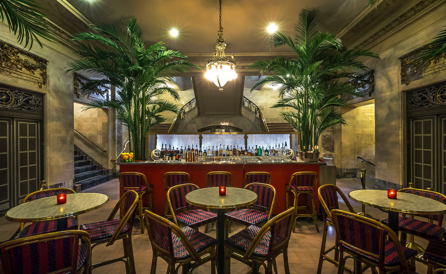 Bar with ceiling lamps and tables