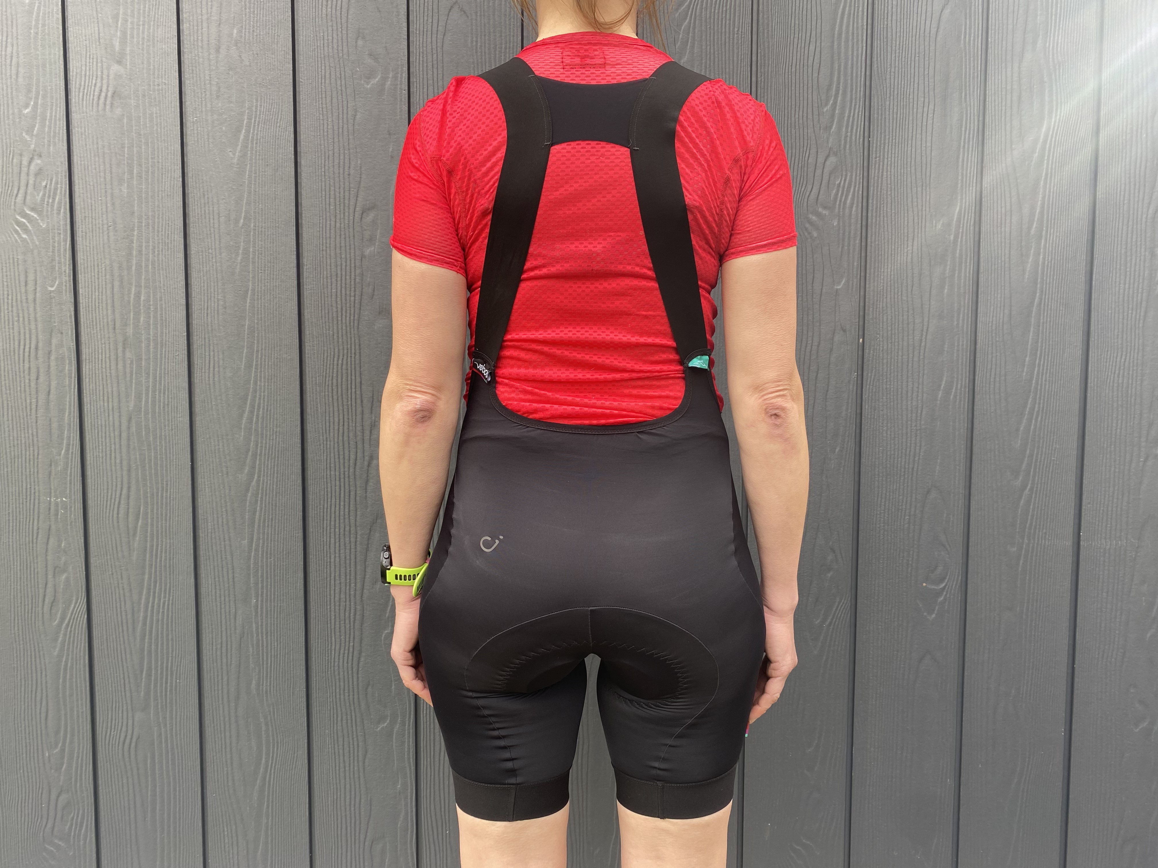 Female cyclist wearing the Velocio Women's Foundation Bib Shorts