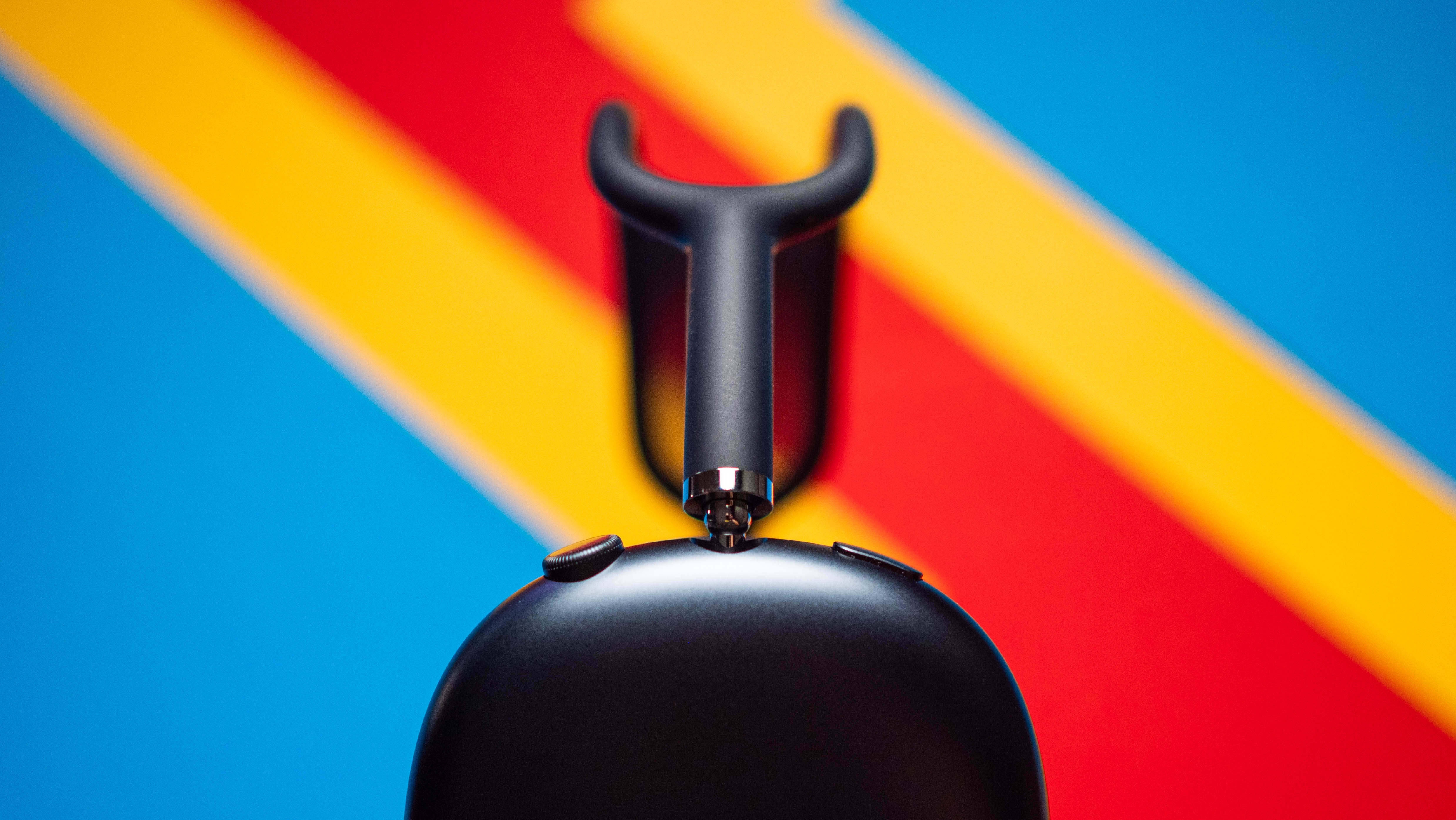 Apple AirPods Max 2 headset against a textured sheet showcasing the design
