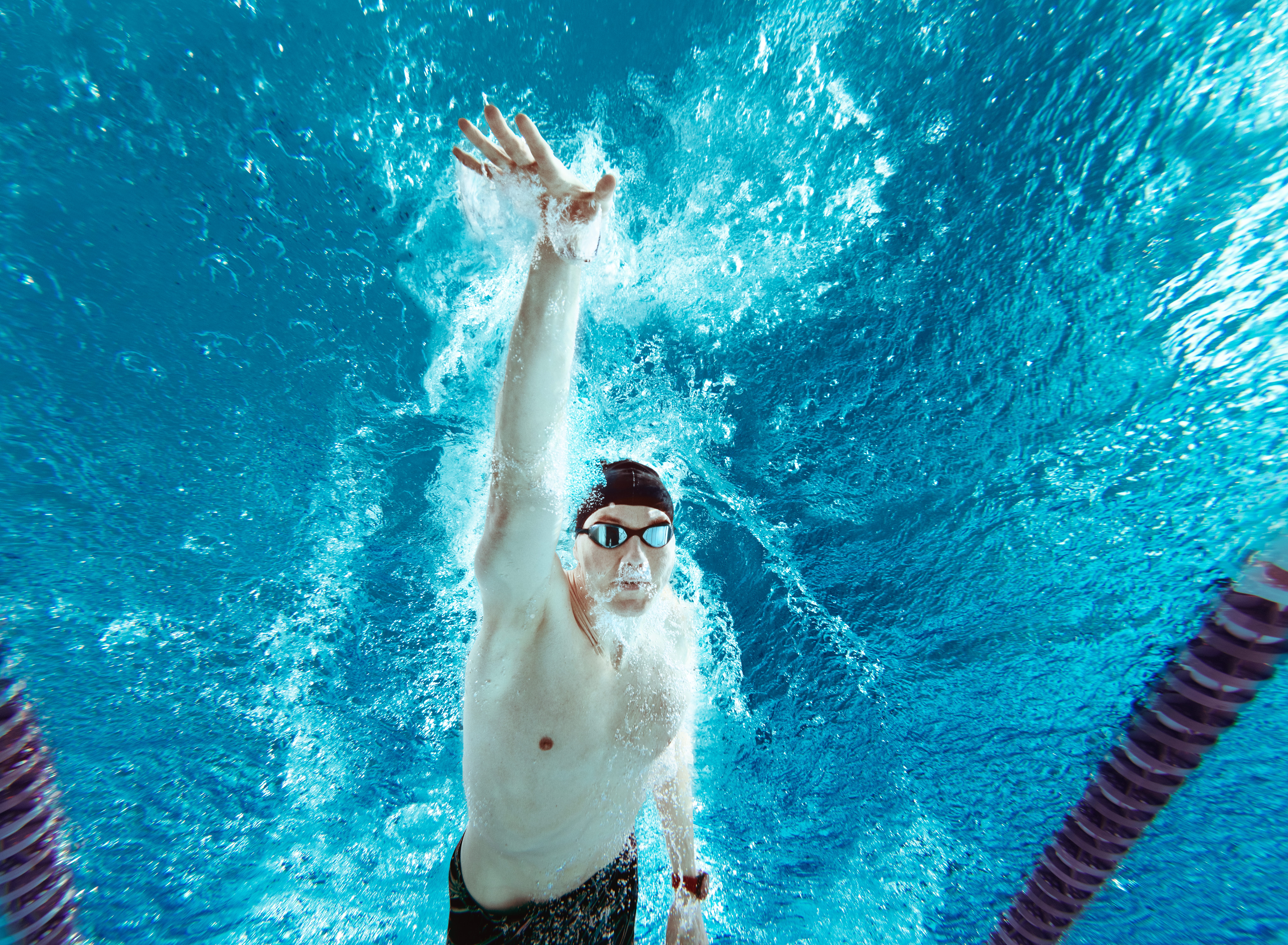 Man swimming in pool