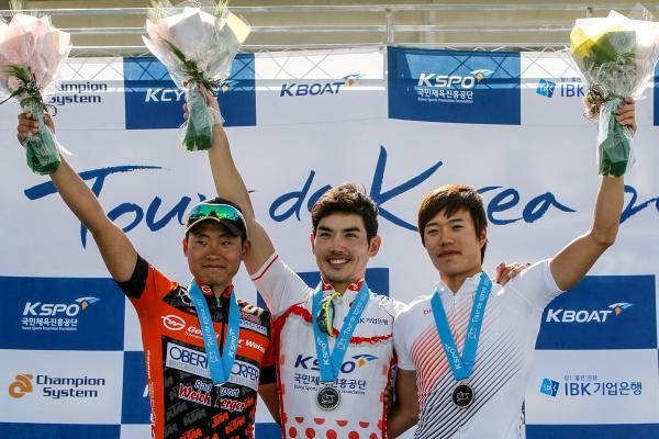 The stage 6 podium (l-r): Kyung Gu Jang, 2nd; Sung Baek Park, 1st; and Keon Woo Park, 3rd.