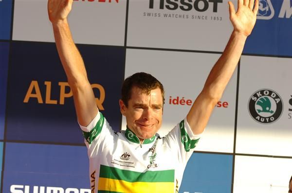 Cadel Evans (Australia) assumes the top step of the podium.