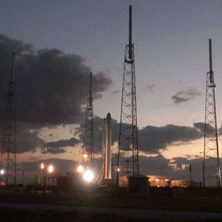 A photo of SpaceX's Falcon 9 rocket during a March 1 launch readiness test at its Cape Canaveral launch pad.
