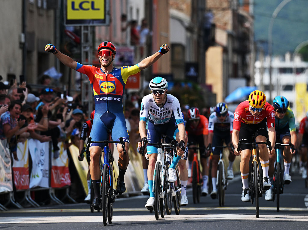 ISSOIRE, FRANCE - JUNE 09: (L-R) Jonathan Milan of Italy and Team Lidl - Trek celebrates at finish line as stage winner ahead of Fred Wright of Great Britain and Team Bahrain - Victorious and Stian Fredheim of Norway and Team Uno-X Mobility during the 77th Criterium du Dauphine 2025, Stage 2 a 204.6km stage from Premilhat to Issoire / #UCIWT / on June 09, 2025 in Issoire, France. (Photo by Dario Belingheri/Getty Images)