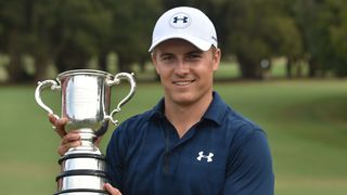 Jordan Spieth with the Australian Open trophy