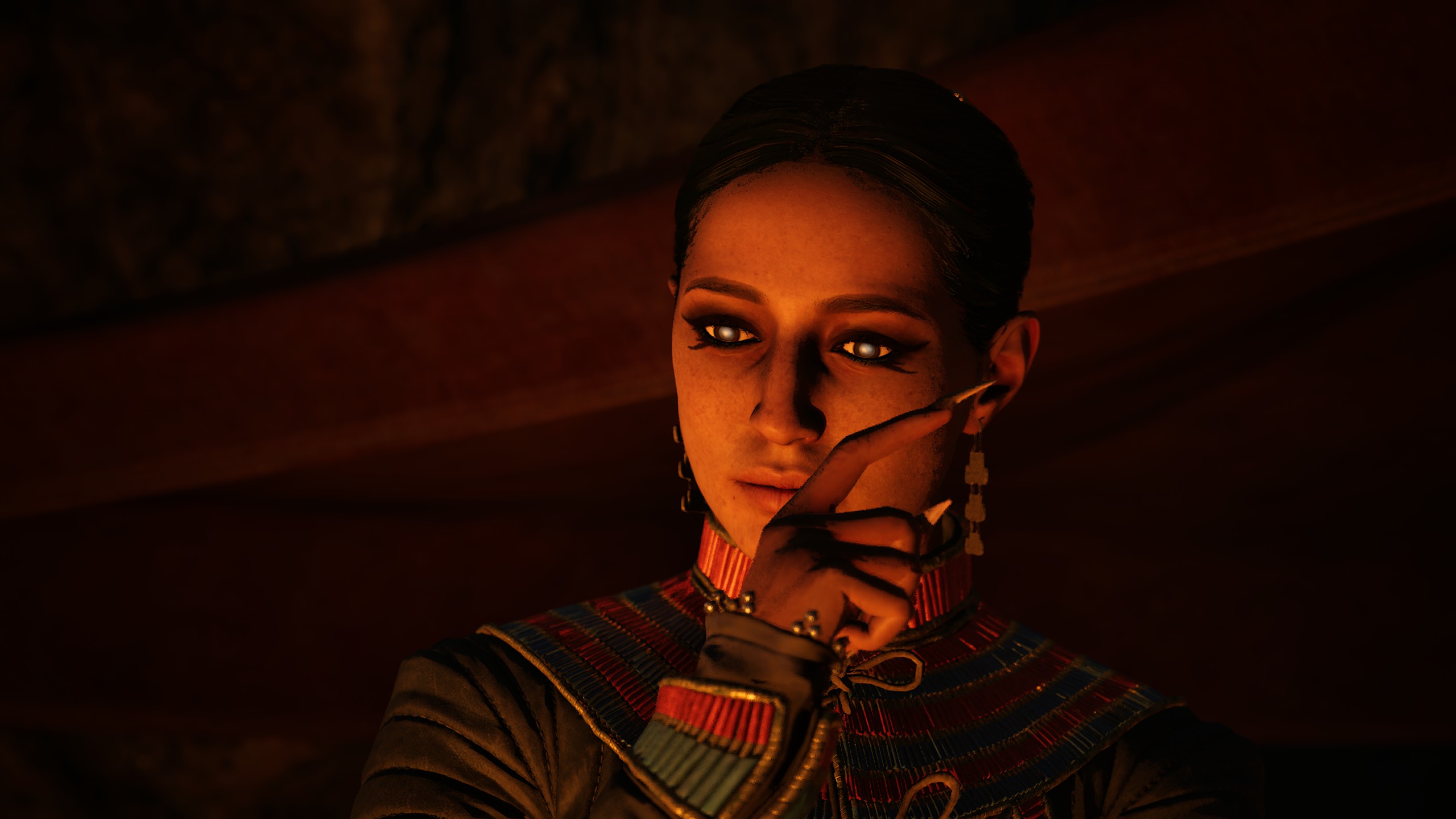 A woman holds a finger upright