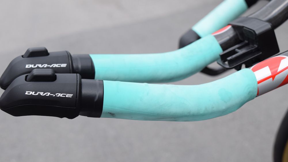 Silicone rubber instead of handlebar tape on the bar extensions for Lotto-JumboNL