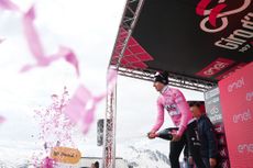 LIVIGNO MOTTOLINO ITALY MAY 19 Tadej Pogacar of Slovenia and UAE Team Emirates Pink Leader Jersey celebrates at podium during the 107th Giro dItalia 2024 Stage 15 a 222km stage from Manerba del Garda to Livigno Mottolino 2387m UCIWT on May 19 2024 in Livigno Mottolino Italy Photo by Dario BelingheriGetty Images