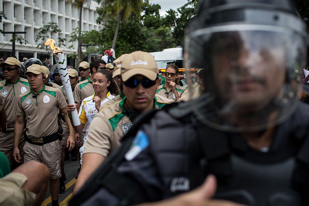 The Olympic torch passes through Rio