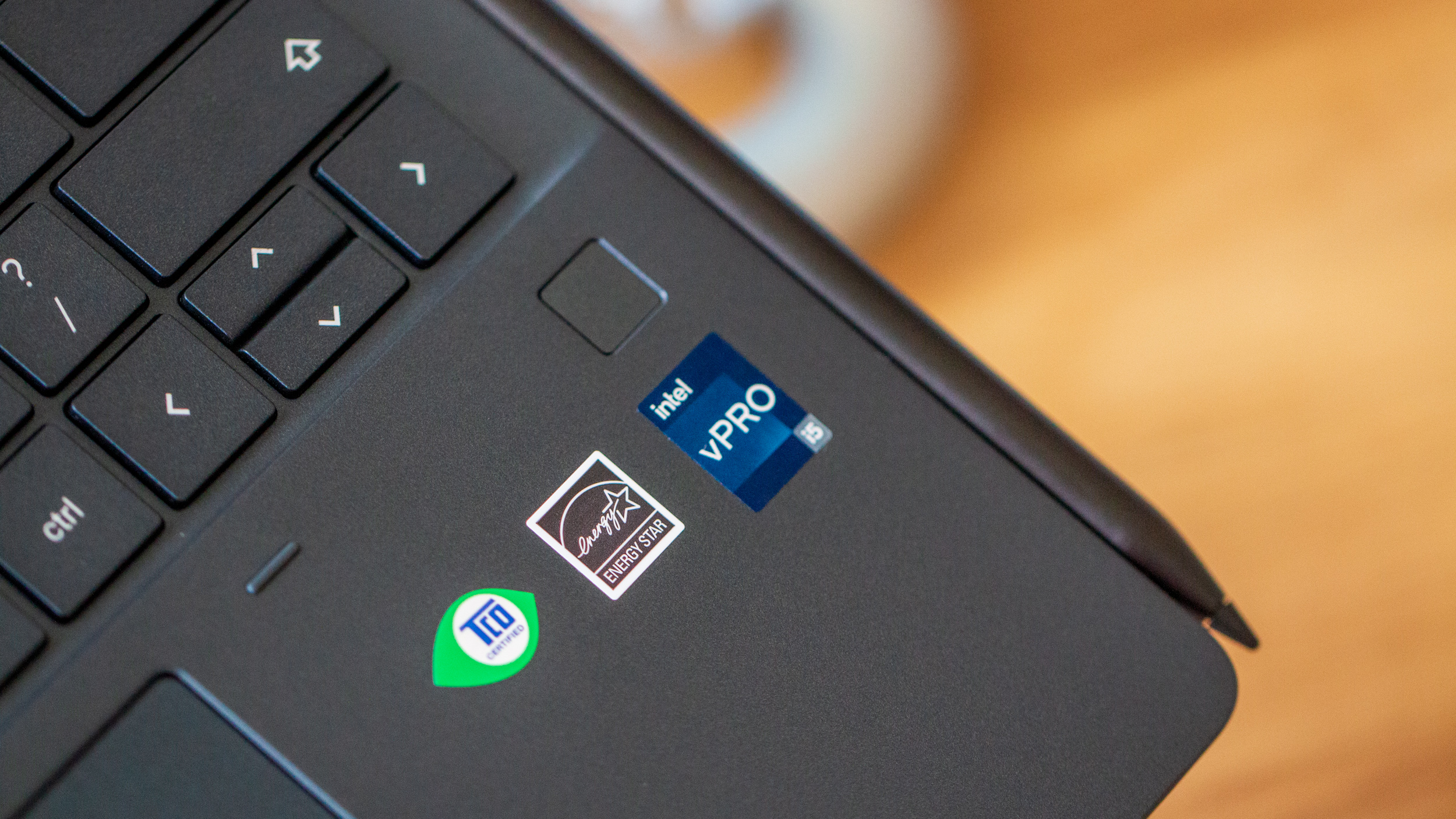 HP Elite Dragonfly Chromebook close-up on fingerprint scanner and Intel logo alt