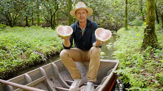 Photo of Phil Keoghan during the melon challenge in Season 35 of The Amazing Race