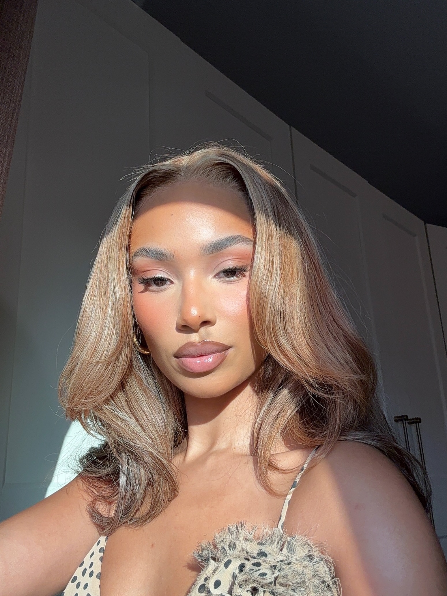 Photo of a woman with monochromatic highlights