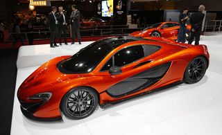 An orange and black mclaren