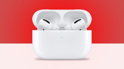 AirPods in case on red background