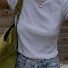 woman wearing vintage jeans with white t shirt and cool bag