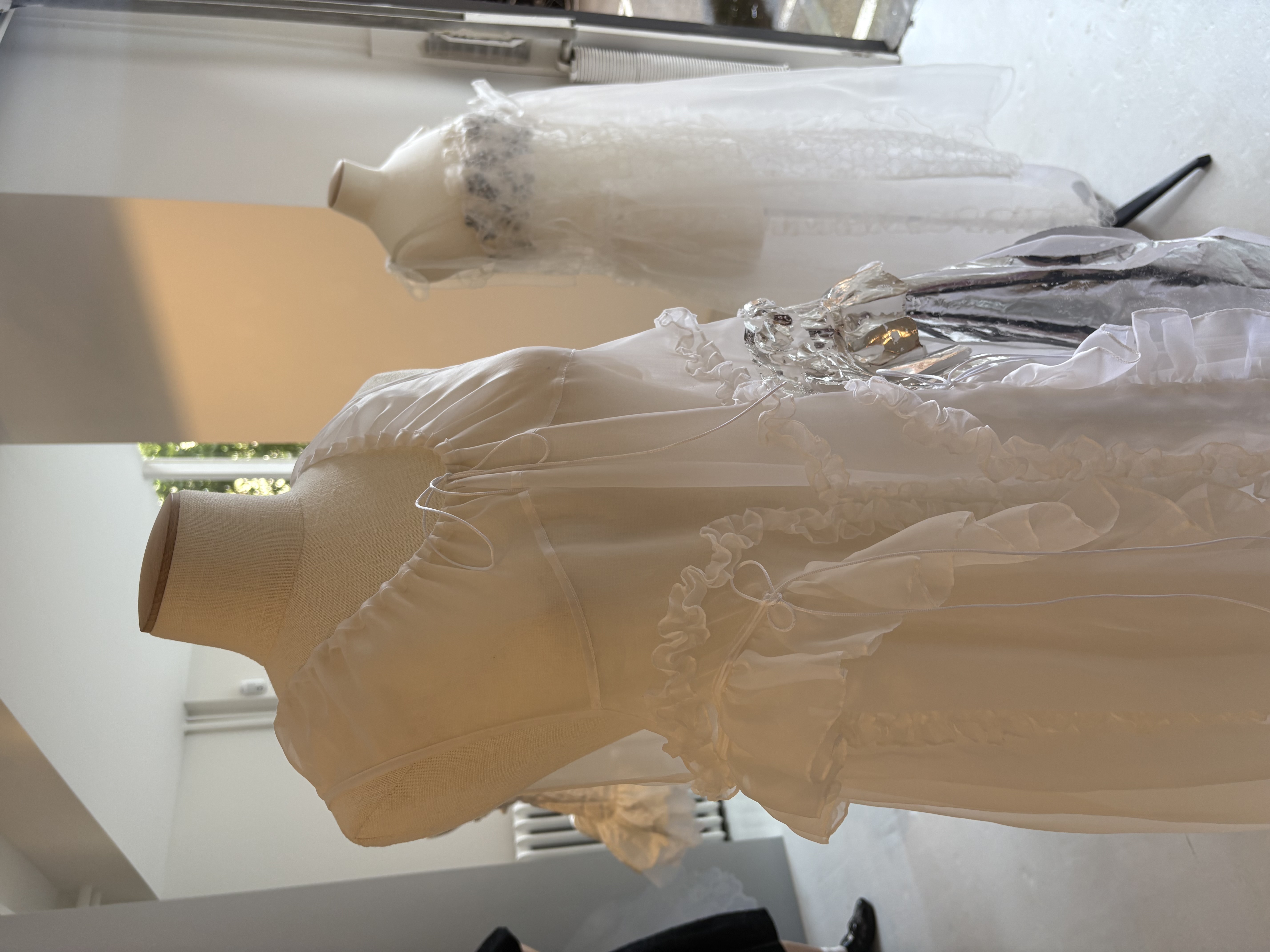 Photo of white Cecile Bahnsen dress during Copenhagen Fashion Week.