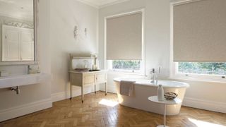large bathroom with parquet floor and freestanding bath