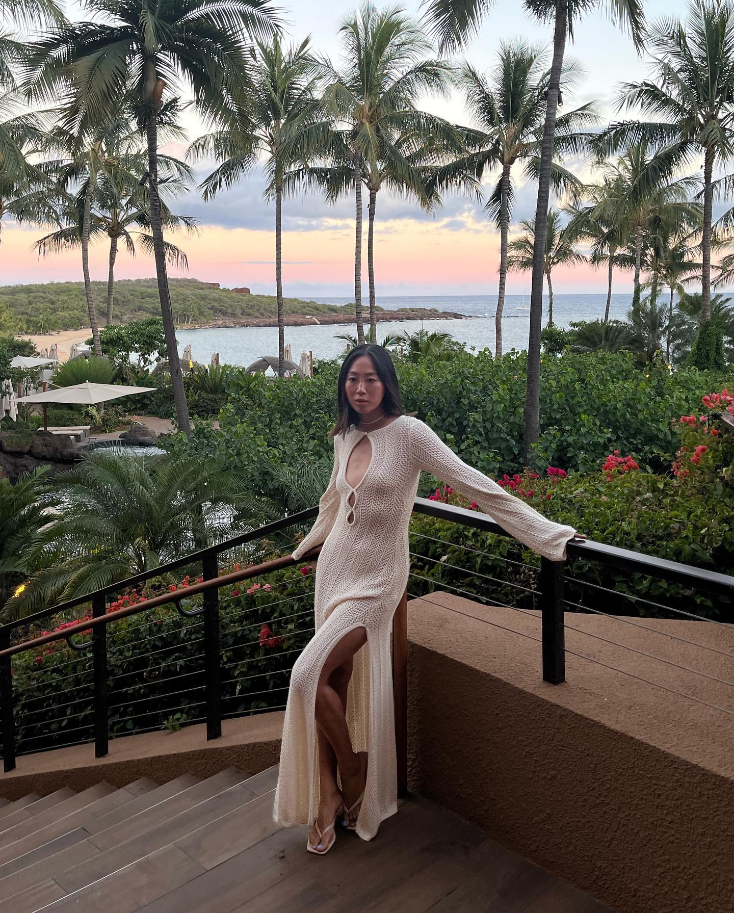 Aimee Song wearing a white crochet dress in Hawaii
