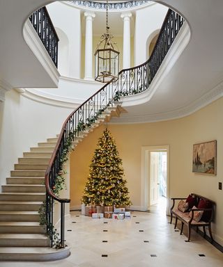 Christmas tree in tiled entryway