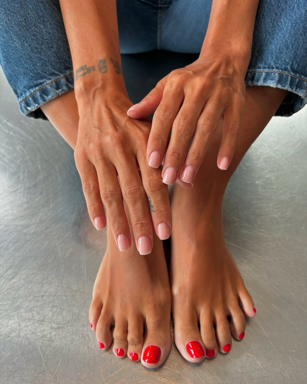 Picante pop red pedicure with milky manicure