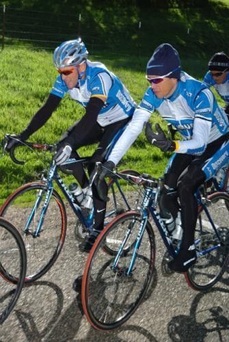 Lance Armstrong and Tom Danielson have a chat during one of the training rides.