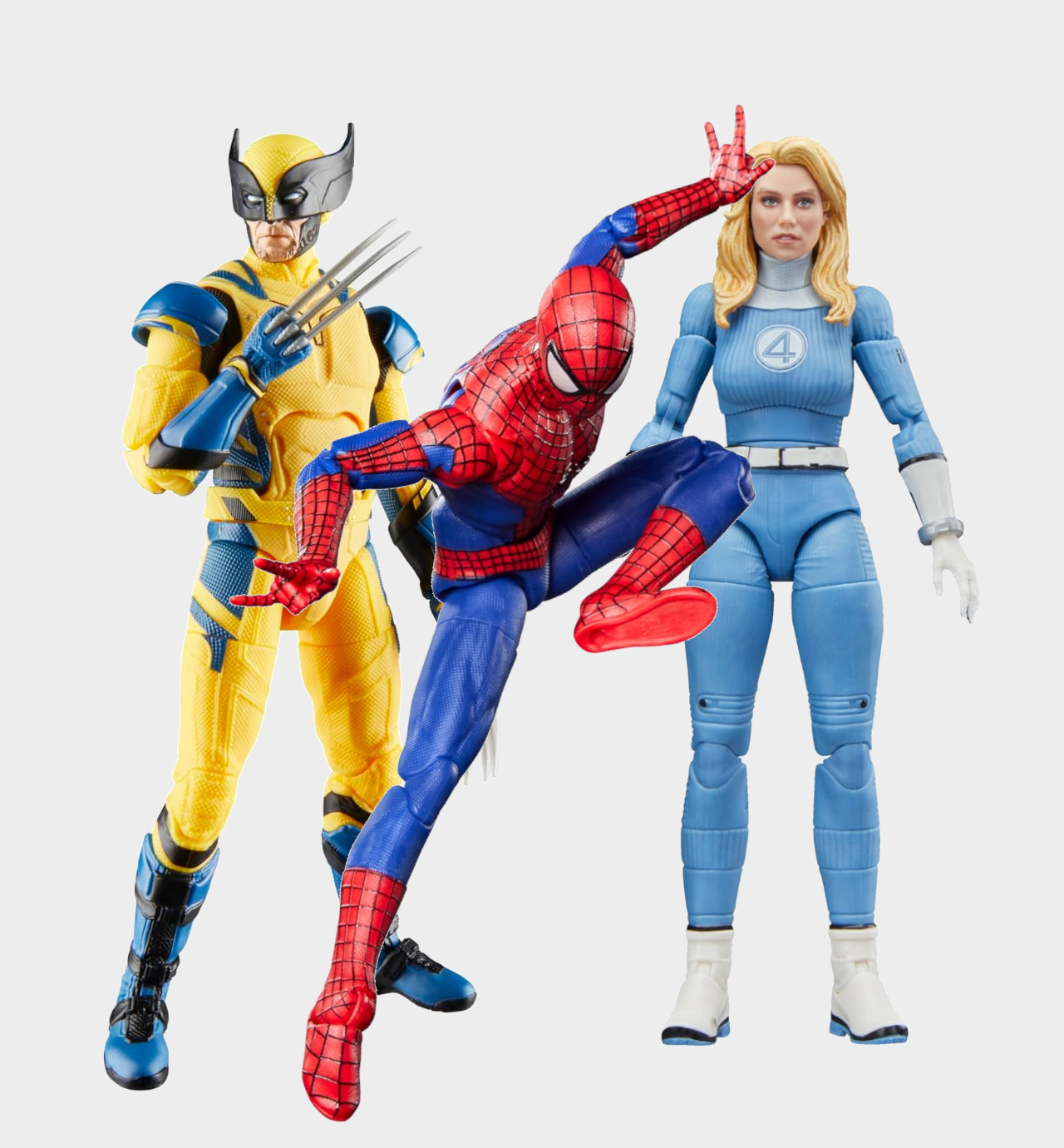 Wolverine, Spider-Man, and Invisible Woman Marvel Legends action figures against a plain background