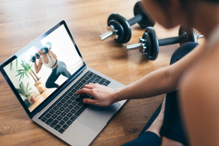 Woman doing strength training at home