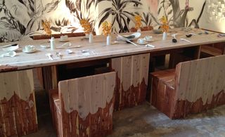 Dining table by Spacecutter, constructed from a single log of wood