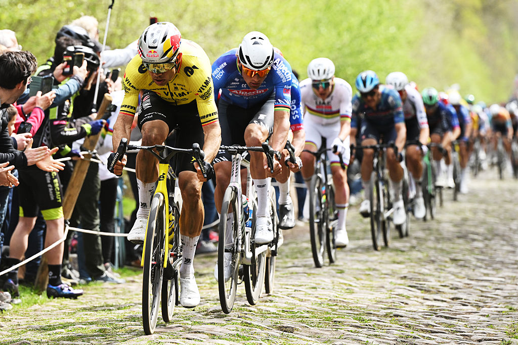 Wout van Aert, Mathieu van der Poel and Tadej Pogacar racing on the cobblestones at Paris-Roubaix