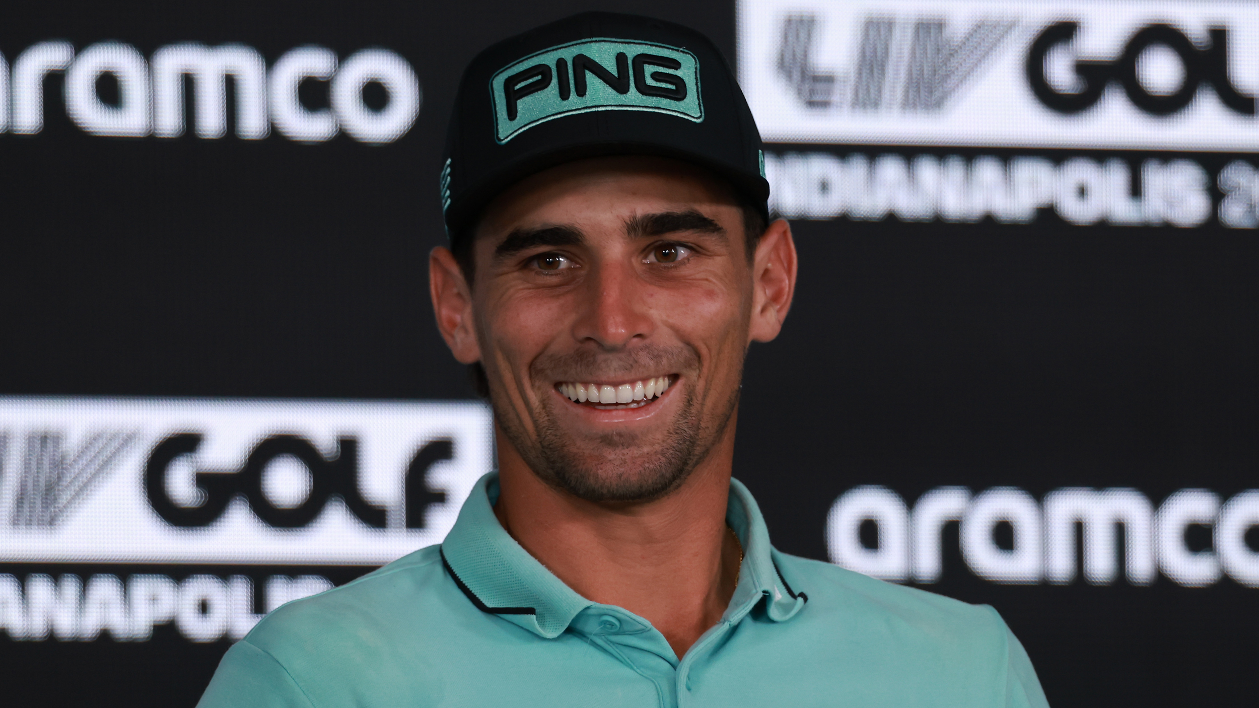 Joaquin Niemann speaks at a LIV Golf press conference