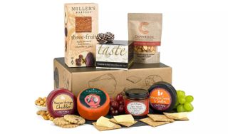 A christmas hamper that's full of cheese and crackers