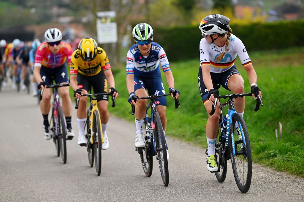 WAREGEM BELGIUM MARCH 29 LR Ashleigh MoolmanPasio of South Africa and AG InsuranceSoudal QuickStep Team and Liane Lippert of Germany and Movistar Team compete in the chase group during the 11th Dwars door Vlaanderen 2023 Womens Elite a 1149km ine day race from Waregem to Waregem DDV23 on March 29 2023 in Waregem Belgium Photo by Luc ClaessenGetty Images