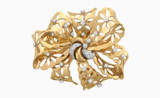 Gold flower brooch