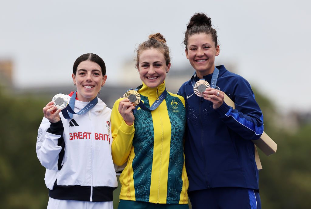 PARIS FRANCE JULY 27 Gold medalist Grace Brown of Team Australia C Silver medalist Anna Henderson of Team Great Britain L and Bronze medalist Chloe Dygert of Team United States R pose on the podium during the Womens Individual Time Trial on day one of the Olympic Games Paris 2024 at Pont Alexandre III on July 27 2024 in Paris France Photo by Tim de WaeleGetty Images