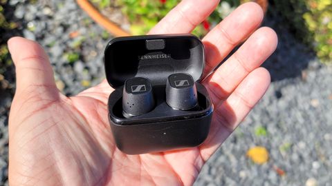 The Sennheiser CX Plus wireless earbuds docked in the charging case