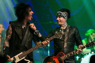 Open up and say aah! Sixx and DJ Ashba as SIXX:AM live in San Francisco