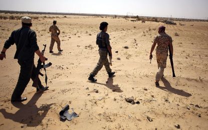 Libya Dawn fighters search for Islamic State militants in March.