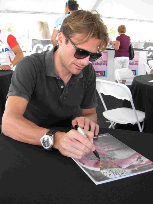 Di Luca was happy to sign autographs at the end of the ride