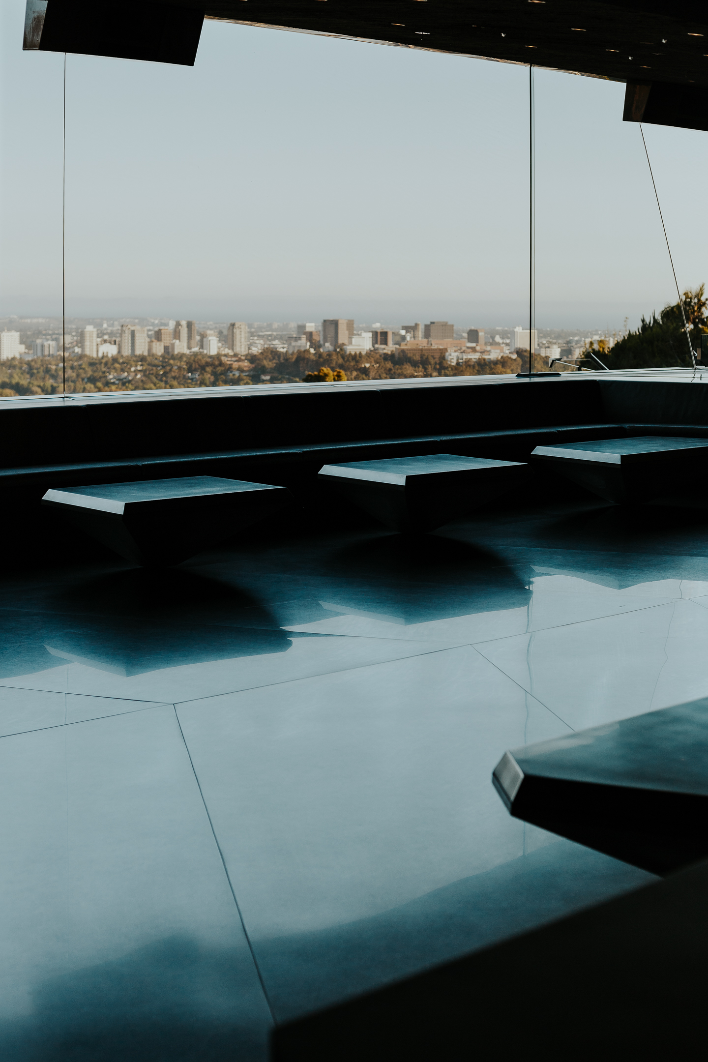 Sheats-Goldstein Residence in LA with its concrete sloped roof, pool and green open grounds