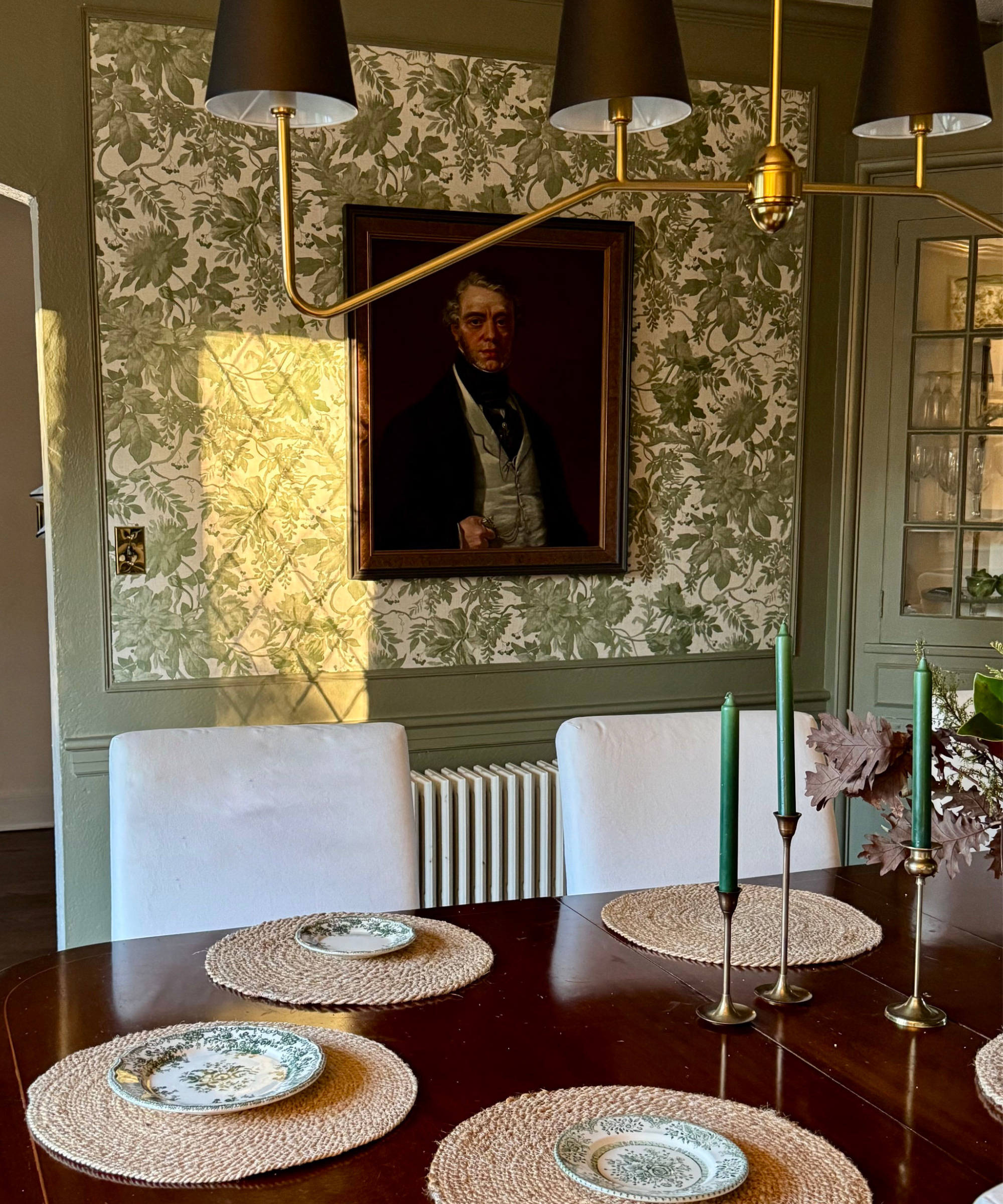green botanical wallpaper dining room