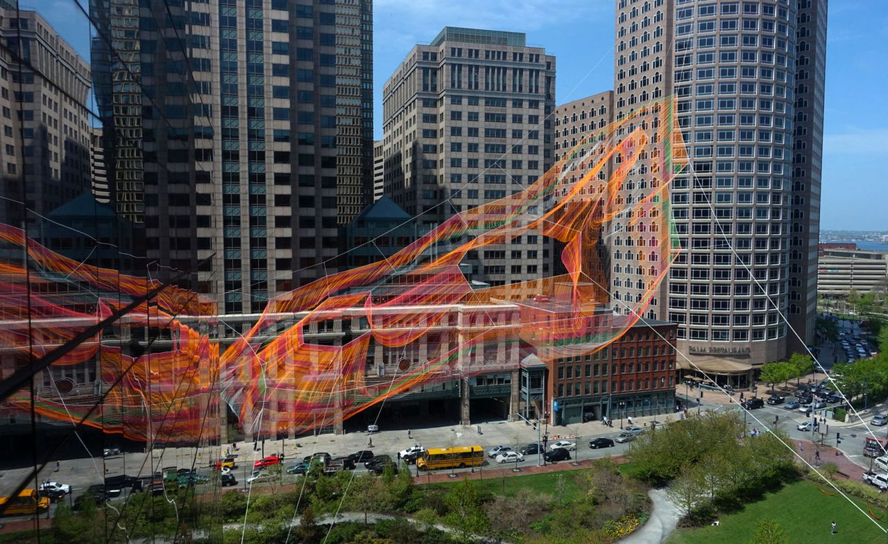 American sculptor Janet Echelman has draped downtown Boston in a lengthy and colourful &#039;spiderweb&#039;